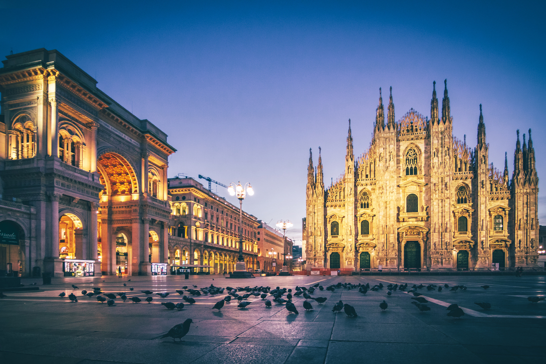 Duomo of Milan stands tall in the center of the frame